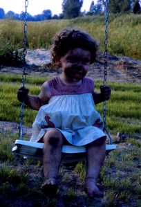 Here's me, muddy, age three